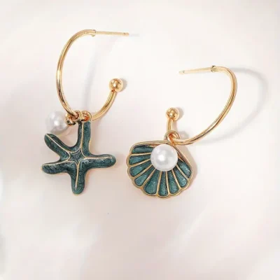 Aretes concha y caracola