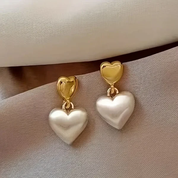Aretes corazon coqueta