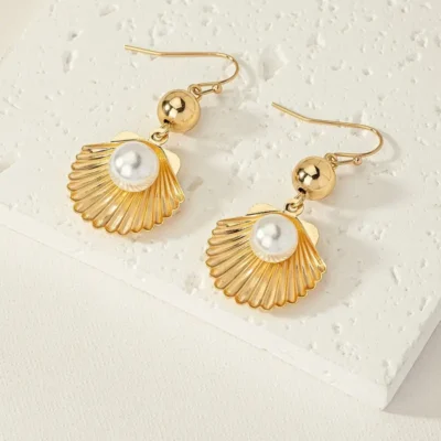 Aretes caracola y perla