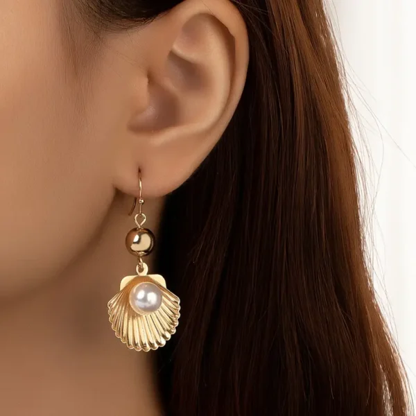Aretes caracola y perla - Imagen 3