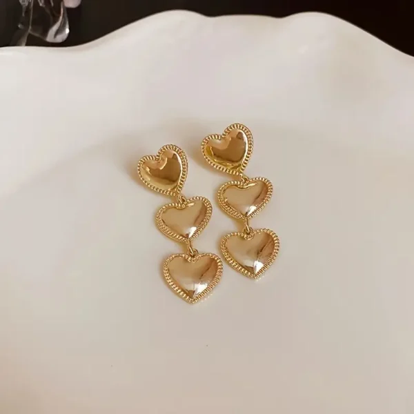 Aretes largos corazones